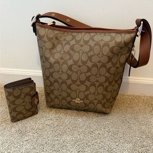 Coach Valerie Duffle Bag w/ Medium Corner zip wallet in matching canvas.